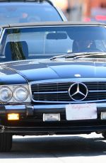 OLIVIA WILDE and Harry Style Out in Their Vintage Mercedes Benz in Los Angeles 10/25/2022