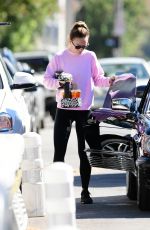 OLIVIA WILDE and Harry Style Out in Their Vintage Mercedes Benz in Los Angeles 10/25/2022