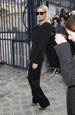 POPPY DELEVINGNE Arrives at Victoria Beckham Show at Paris Fashion Week 09/30/2022