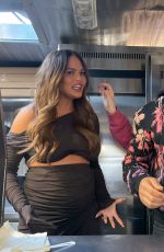Pregnant CHRISSY TEIGEN and John Legend Promotes Their New Food Truck Venture Cravings in West Hollywood 10/25/2022