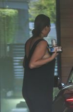 Pregnant CHRISSY TEIGEN Arrives at Her Office in Los Angeles 10/05/2022