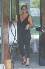 Pregnant CHRISSY TEIGEN Arrives at Her Office in Los Angeles 10/05/2022