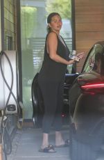 Pregnant CHRISSY TEIGEN Arrives at Her Office in Los Angeles 10/05/2022