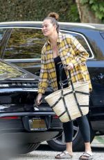 Pregnant CHRISSY TEIGEN at a Friend