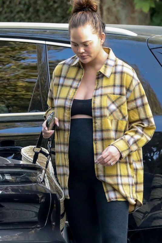 Pregnant CHRISSY TEIGEN at a Friend