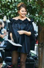Pregnant CHRISSY TEIGEN Gets a Wardrobe Change on a Movie Set in Los Angeles10/17/2022