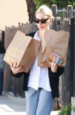 AUBREY PLAZA Shopping at Courage Bagels in Los Angeles 11/27/2022