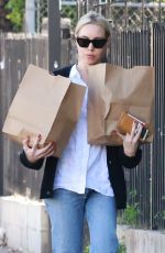 AUBREY PLAZA Shopping at Courage Bagels in Los Angeles 11/27/2022