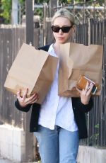 AUBREY PLAZA Shopping at Courage Bagels in Los Angeles 11/27/2022