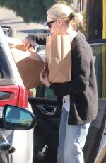 AUBREY PLAZA Shopping at Courage Bagels in Los Angeles 11/27/2022