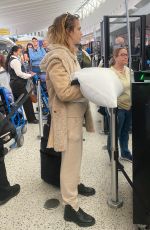 CARA DELEVINGNE at JFK Airport in New York 11/04/2022