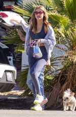 CHRISHELL STAUSE Loading a New Guitar into the Trunk of Her Car in Studio City 11/15/2022
