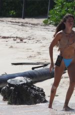 CLARA BERRY in Bikini Picking the Trash from the Beach in Tulum 11/19/2022