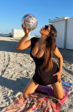 CLAUDIA ROMANI in Bikini at a Beach in Miami 11/17/2022