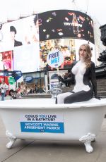 FAYE WINTER Poses for Orcas in a Bathtub in Piccadilly Circus in London 11/18/2022