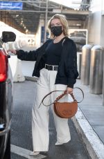 FLORENCE PUGH Arrives at LAX Airport in Los Angeles 11/14/2022