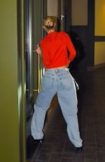 GIGI HADID in a Baggy Denim and Red Top Out in New York 11/18/2022