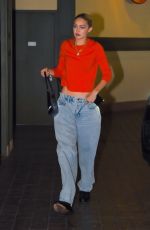 GIGI HADID in a Baggy Denim and Red Top Out in New York 11/18/2022