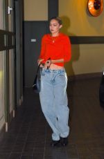 GIGI HADID in a Baggy Denim and Red Top Out in New York 11/18/2022