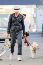 JULIANNA MARGUILES Out Shopping with Her Dog in New York 04/11/2022