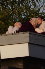 KELLY GALE and Joel Kinnaman Watch Sunset From a Rooftop in Los Angeles 11/22/2022