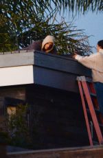 KELLY GALE and Joel Kinnaman Watch Sunset From a Rooftop in Los Angeles 11/22/2022