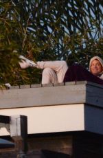 KELLY GALE and Joel Kinnaman Watch Sunset From a Rooftop in Los Angeles 11/22/2022