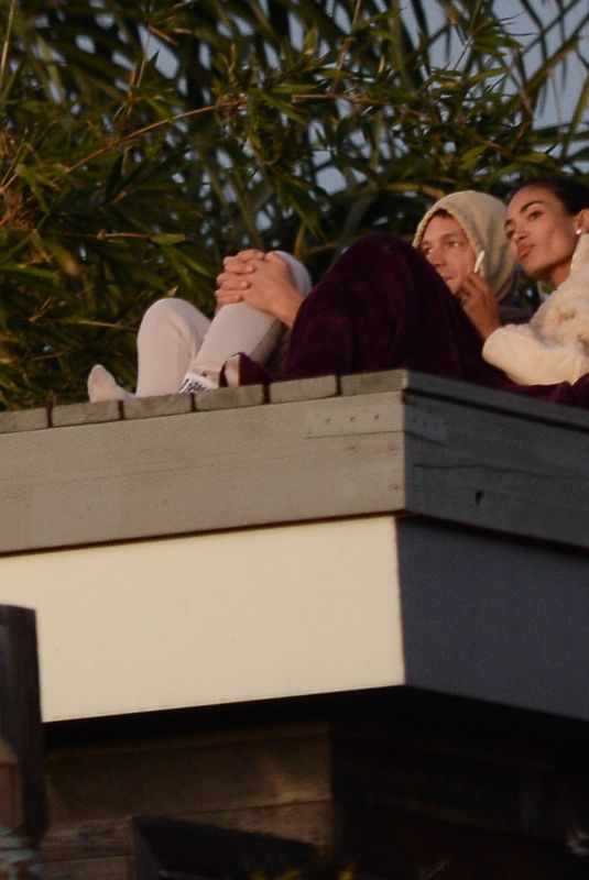 KELLY GALE and Joel Kinnaman Watch Sunset From a Rooftop in Los Angeles 11/22/2022