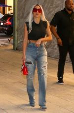 KIM KARDASHIAN in Ripped jeans Out Shopping in Miami 11/14/2022