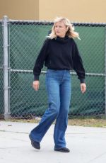 MALIN AKERMAN in a Flared Denim and Black Hoody Out in Los Angeles 11/08/2022