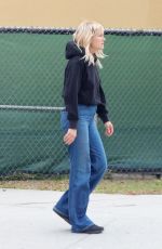 MALIN AKERMAN in a Flared Denim and Black Hoody Out in Los Angeles 11/08/2022