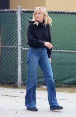 MALIN AKERMAN in a Flared Denim and Black Hoody Out in Los Angeles 11/08/2022