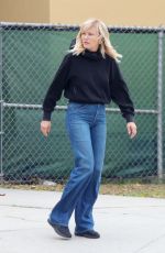 MALIN AKERMAN in a Flared Denim and Black Hoody Out in Los Angeles 11/08/2022