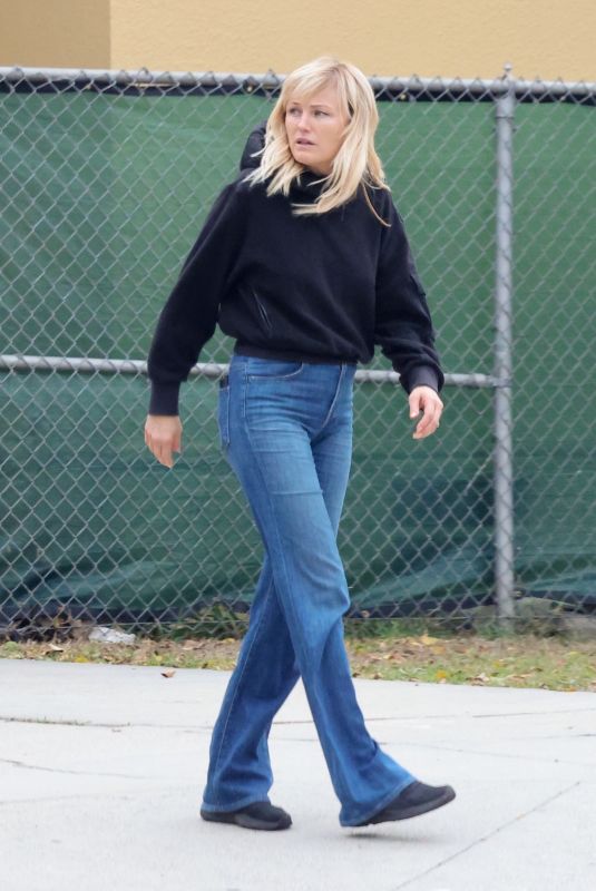 MALIN AKERMAN in a Flared Denim and Black Hoody Out in Los Angeles 11/08/2022
