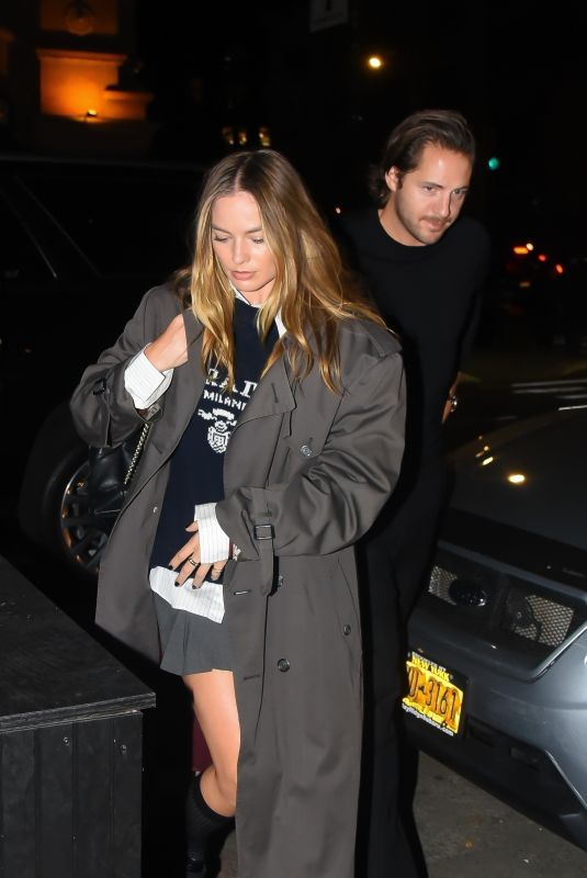 MARGOT ROBBIE Leaves Cara Delevingne