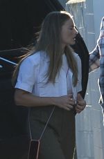 MARGOT ROBBIE Loads Luggage into a Car in Los Angeles 11/20/2022