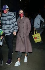 MILA KUNIS and Ashton Kutcher Leaves LA Lakers vs Brooklyn Nets Game at Crypto Arena in Los Angeles 11/13/2022
