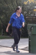 RENA SOFER Repositions the Trash Bins in Front of Her House in Los Angeles 11/01/2022