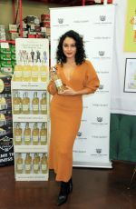 VANESSA HUDGENS and ASHLEY BENSON Sign Bottles of Thomas Ashbourne Craft Spirits in Las Vegas 11/04/2022
