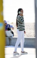 YARA SHAHIDI on the Set of Sitting in Bars Eating Cake at a Beach in Los Angeles 11/17/2022