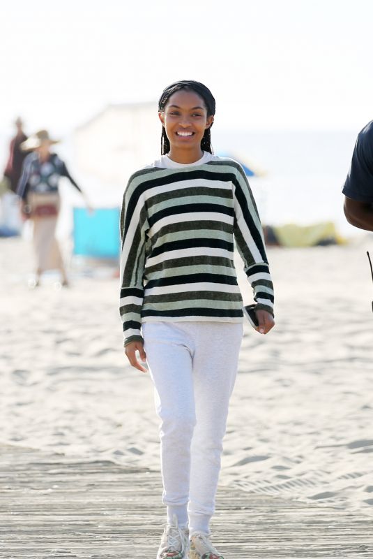 YARA SHAHIDI on the Set of Sitting in Bars Eating Cake at a Beach in Los Angeles 11/17/2022