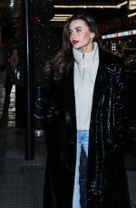 AMBER DAVIES Leaves Savoy Hotel in London 12/113/2022