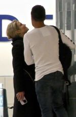 AMY ROBACH and TJ Holmes at Airport in Atlanta 12/27/2022