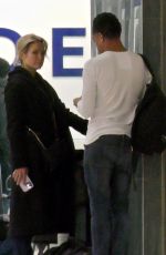 AMY ROBACH and TJ Holmes at Airport in Atlanta 12/27/2022