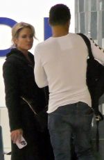 AMY ROBACH and TJ Holmes at Airport in Atlanta 12/27/2022