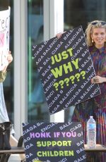ANNALYNNE MCCORD at a Protest at Balenciaga Store in Beverly Hills 12/03/2022