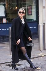 ASHLEY ROBERTS Arrives at Heart Radio in London 12/07/2022