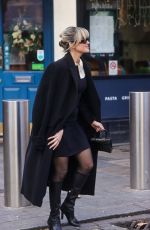 ASHLEY ROBERTS Arrives at Heart Radio in London 12/07/2022