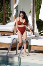 CASEY BATCHELOR in Bikini on Holiday in Ibiza 12/27/2022