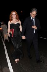 CHRISTINA HENDRICKS and George Bianchini Arrives at a Holiday Party in Brentwood 12/03/2022